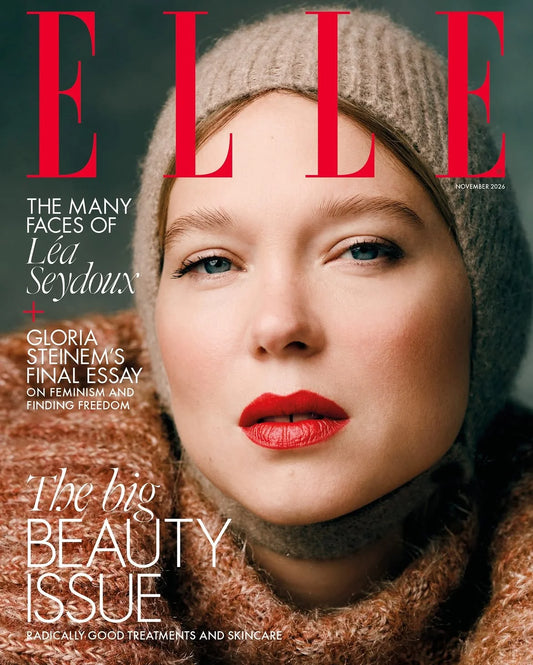 ELLE UK november 2026 med Léa Seydoux i beige strikhue og rød læbestift på forsiden af The Big Beauty Issue.